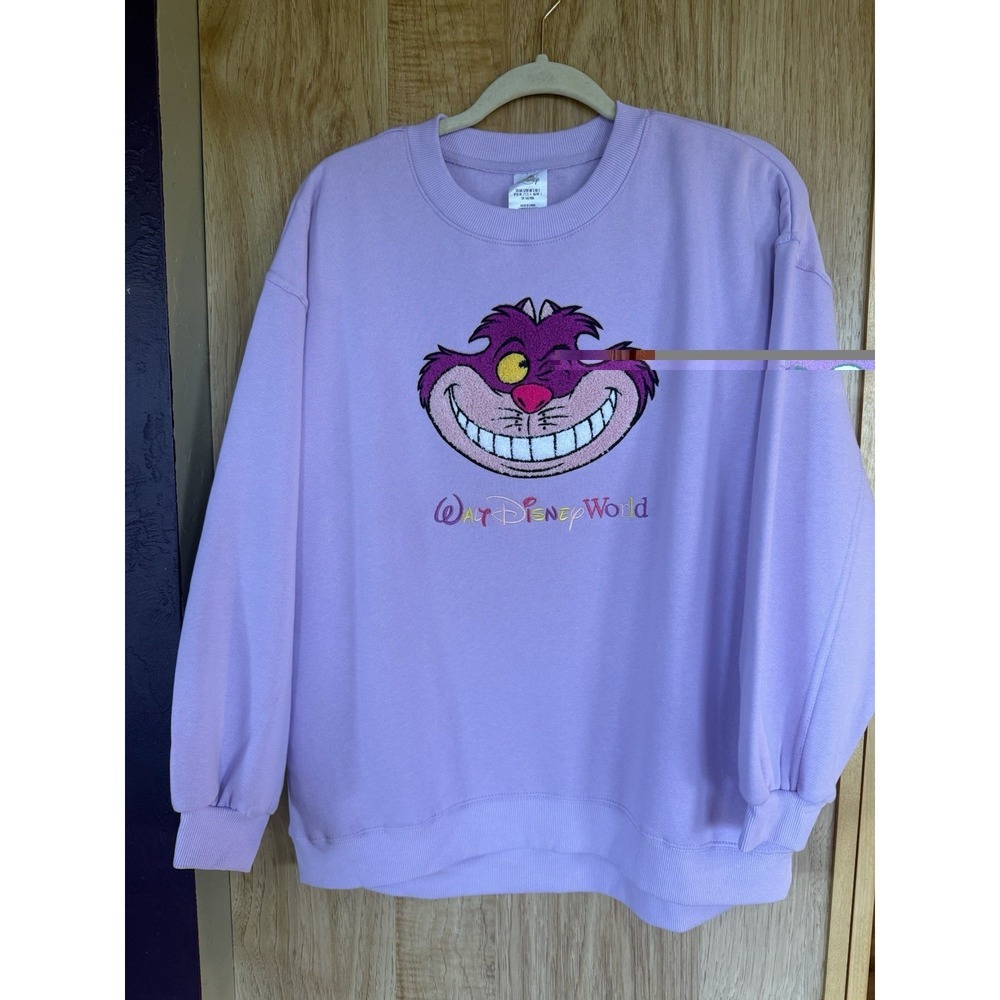 Disney Parks Cheshire Cat Embroidered Graphic Crew Neck Sweatshirt S 2026 NWT
